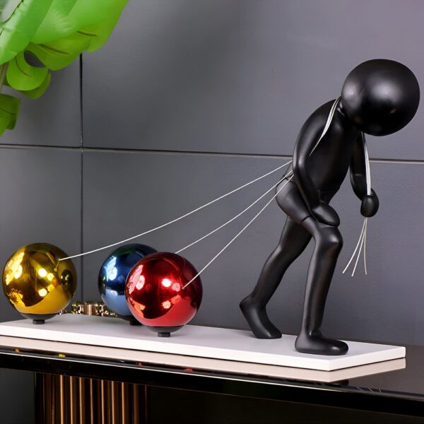 Pulling Ball Resin Statue